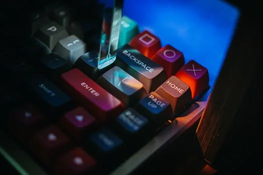 close-up of red, blue and brown mechanical keyboard switches lined up on a desk, macro photography, soft window light