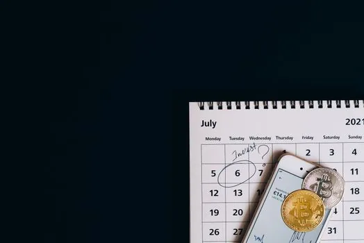 smartphone checking subscription renewal calendar
