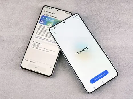 Galaxy phone connected to laptop for Smart Switch transfer, realistic clean desk, no text