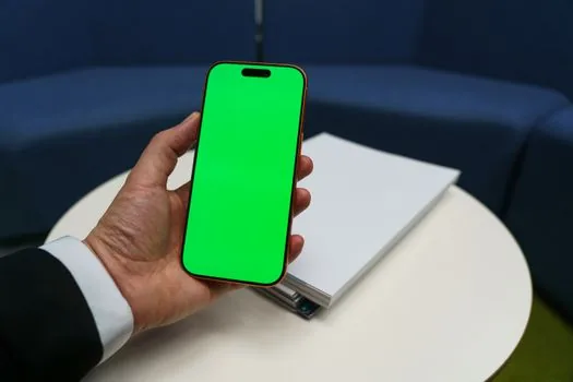 Korean fan checking SMTOWN app notification settings on smartphone, concert ticket and lightstick nearby, clean desk, realistic editorial photo, no readable text