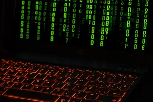 Korean IT security team checking approved AI access request and scope checklist on laptop, realistic office photo, hardware security key visible | AI 보안 도구 접근 승인 범위를 확인하는 장면