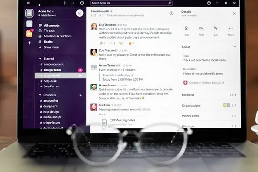 Windows 11 laptop on a desk with video meeting app showing black camera preview, user checking privacy settings, bright realistic workspace | 화상회의 앱에서 카메라 화면이 검게 나와 설정을 확인하는 장면