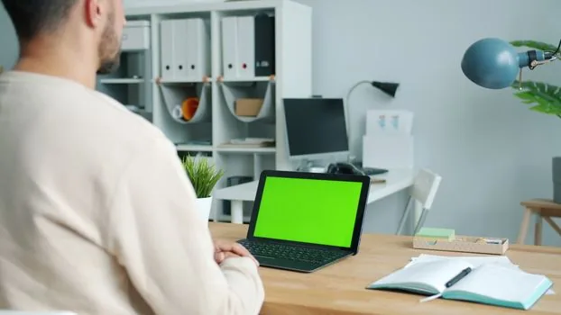 Korean user checking Windows 11 storage usage screen on laptop, C drive nearly full, clean desk, realistic editorial photo