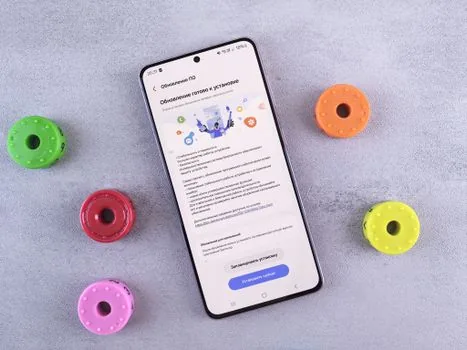 Samsung Galaxy user checking Secure Folder privacy settings and saved photos on a bright desk